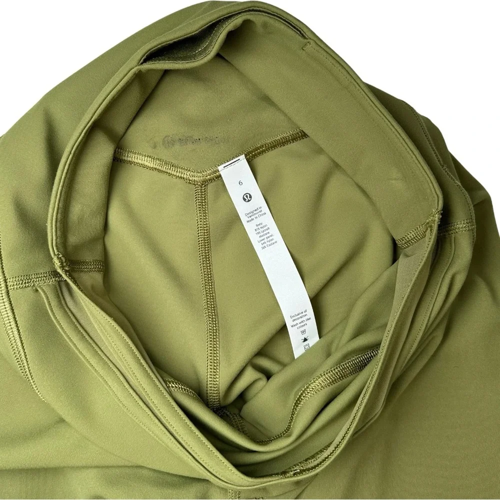 Lululemon Nulu and Crisscross Mesh Stirrup Tight‎ Bronze Green W5ERXS Size 6